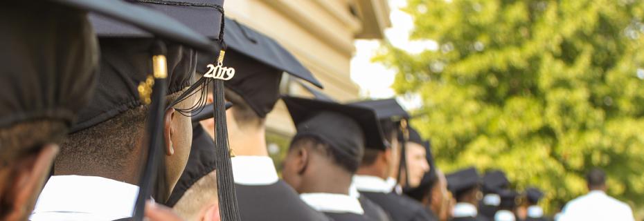 DJJ youth walking to graduation ceremony